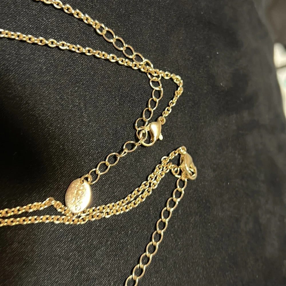 Kids two 18” sisters heart gold colored necklace with a 1” extender. Gently used